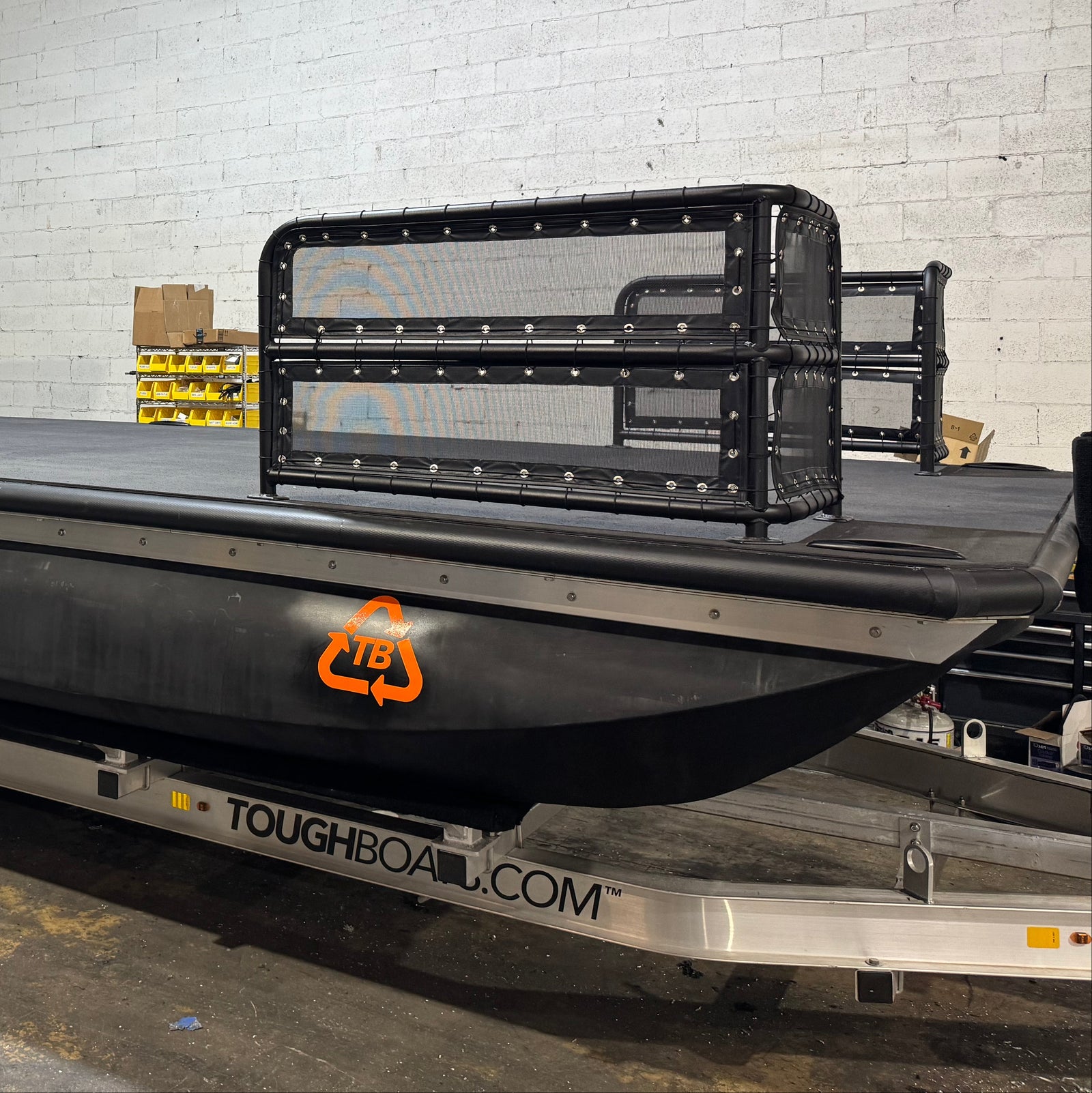 Tough Boat 25-TWorange equipment in a warehouse setting